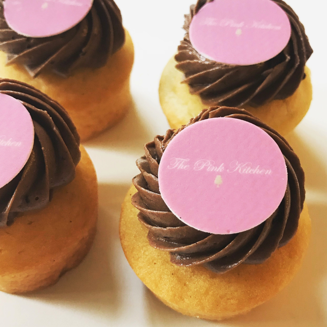 Branded logo cupcakes with custom icing for corporate catering and events across London