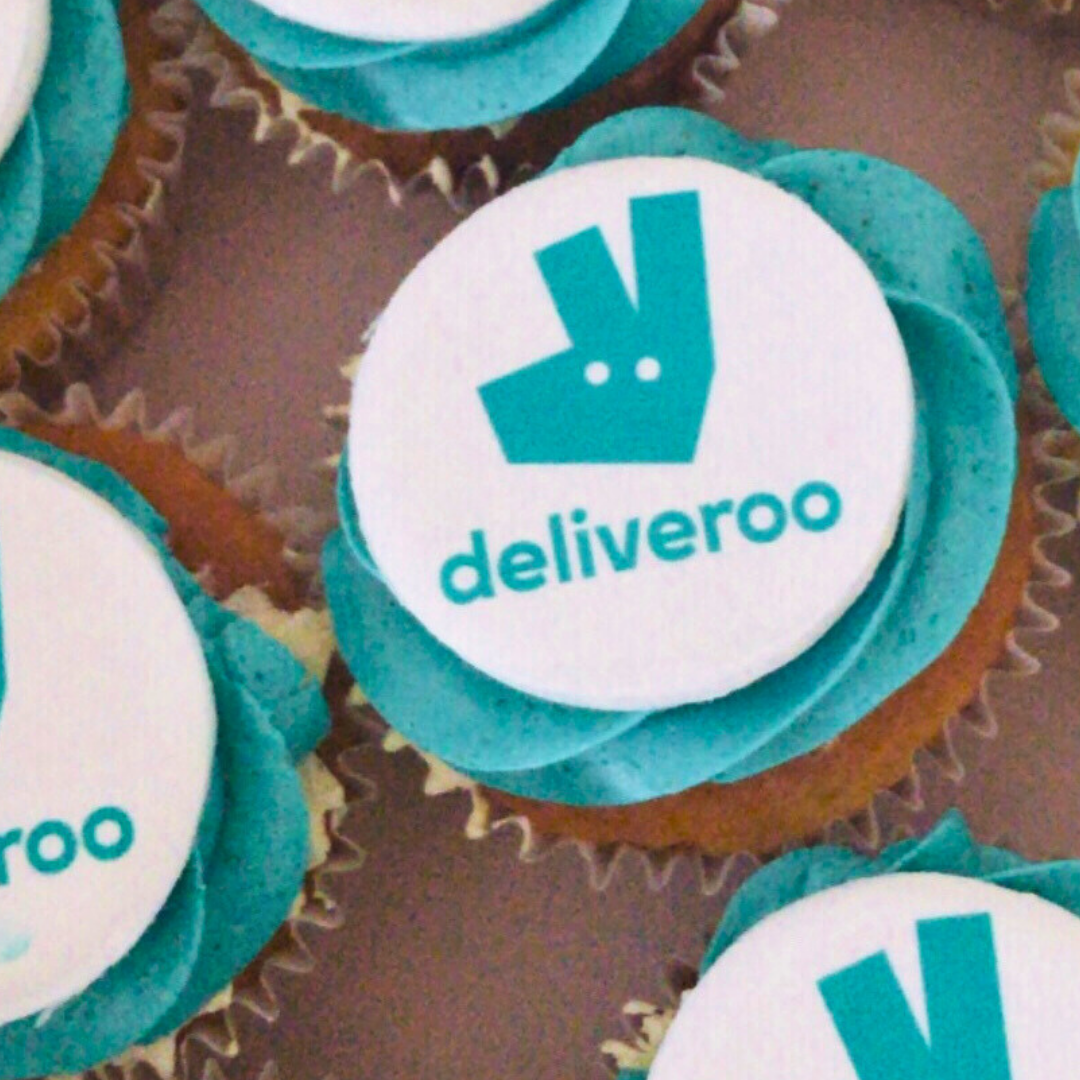 Colourful icing corporate cupcakes  with custom company branding for a business event in London Mayfair