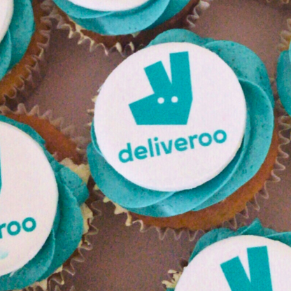 Colourful icing corporate cupcakes  with custom company branding for a business event in London Mayfair
